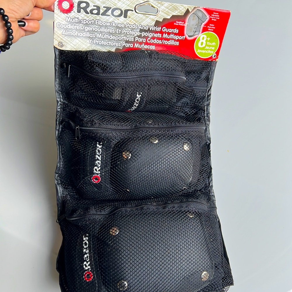 Razor multi sport, elbow/knee pads, and wrist guards size 8+ youth